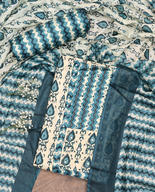 Sandal-Base and Blue Cotton Material Chudidar Set, Adorned with Batik-Style Intricate Print on Its Top, a Batik Chevron Printed Cotton Bottom, and Paired with an Intricately Printed Dupatta