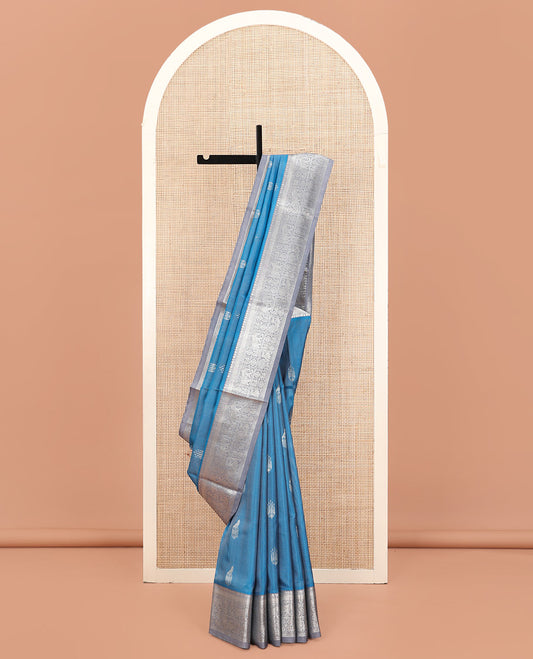 Blue Venkatagiri Silk Saree, Woven with Zari Buttas All Over Its Body, Complemented by a Contrast Traditional Zari Border of Peacock, Elephant, and Chakram Designs, Jaal Design Pallu, and Paired with a Contrast Blouse