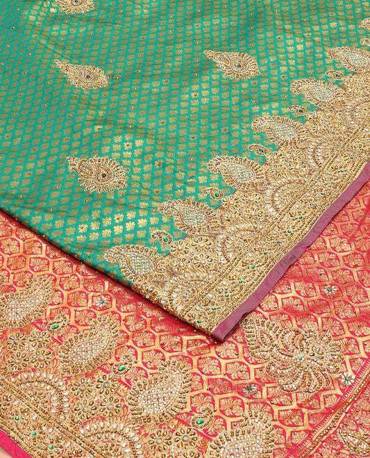 Green jacquard embroidered silk saree, contrast stone embroidered scallop cutwork border & zari woven stone embroidery pallu