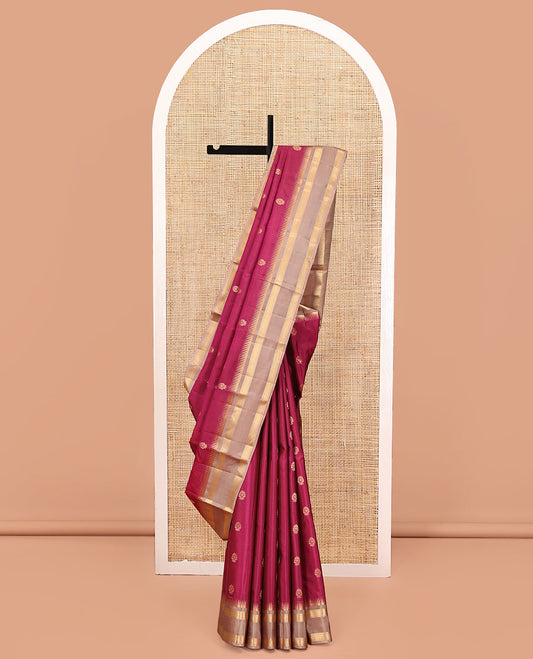 Maroon Vasundhara Silk Mix Saree, Ornamented With Zari Buttas All Over Its Body, Complemented by Rettai Pettu Border of Rekku Designs, Vanki Design Pallu and Paired with a Contrast Blouse