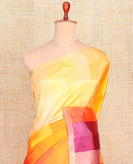 Multi-Color Checked Banana Pith Saree, Sparsely Designed Zari Bavanji Border, Complemented with a Contrast Zari Striped Pallu, and a Plain Blouse