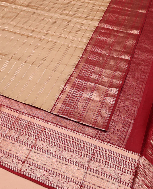 Sandal Vasundhara Silk Saree Elevated with Zari Stripes All Over Its Body, Complemented by a Contrast Border of Manga, Rudraksham, Yaali, Neli, and Muthu Designs, Zari Rich Jaal Pallu, and Paired with a Contrast Blouse