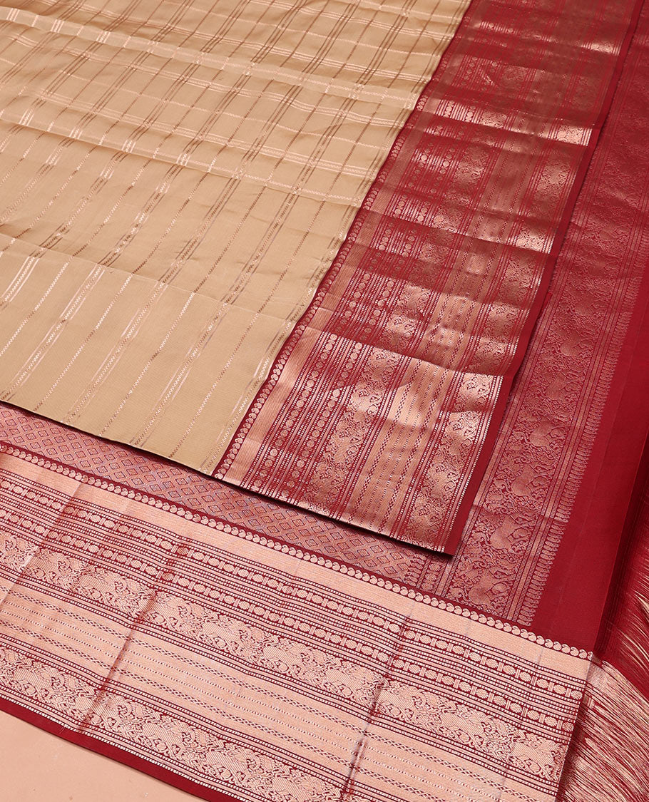 Sandal Vasundhara Silk Saree Elevated with Zari Stripes All Over Its Body, Complemented by a Contrast Border of Manga, Rudraksham, Yaali, Neli, and Muthu Designs, Zari Rich Jaal Pallu, and Paired with a Contrast Blouse