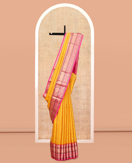Yellow Vasundhara Silk Saree, Sparsely Threaded with Zari Checks, a Contrast Border of Kathir, Kuyil Kann, Manga, and Mayil Designs, Floral Design Pallu, and a Contrast Blouse