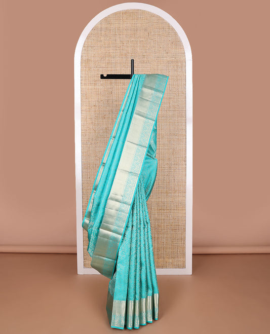 Blue floral design kancheepuram silk saree with self border of  rekku, paun design & zari design pallu