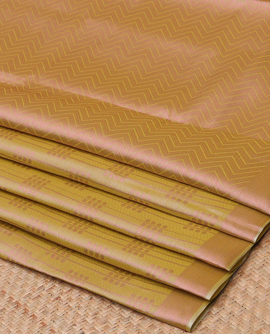 Green Semi banaras tissue saree with zari buttas & stripes, self-border & pallu of chevron designs