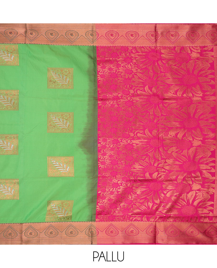 Green semi-soft silk saree with zari buttas, traditional zari border & contrast pallu of floral designs
