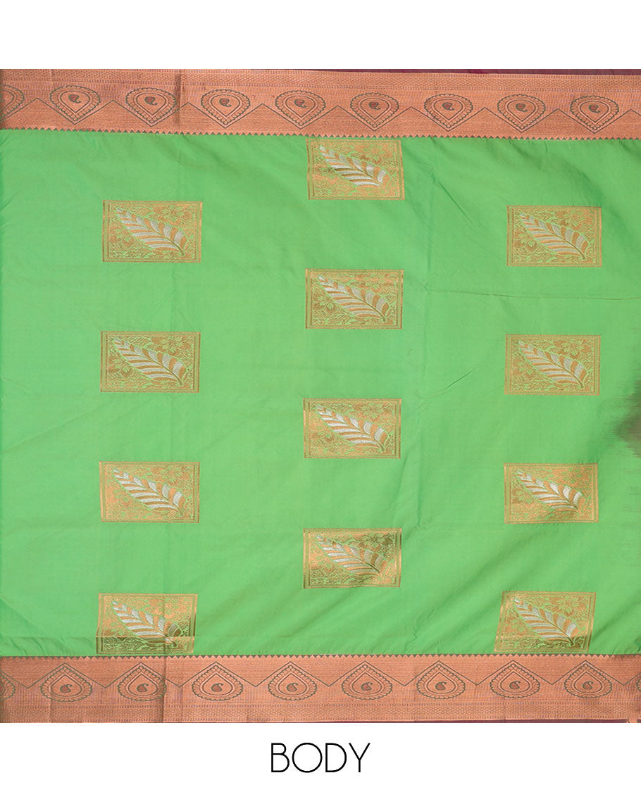 Green semi-soft silk saree with zari buttas, traditional zari border & contrast pallu of floral designs