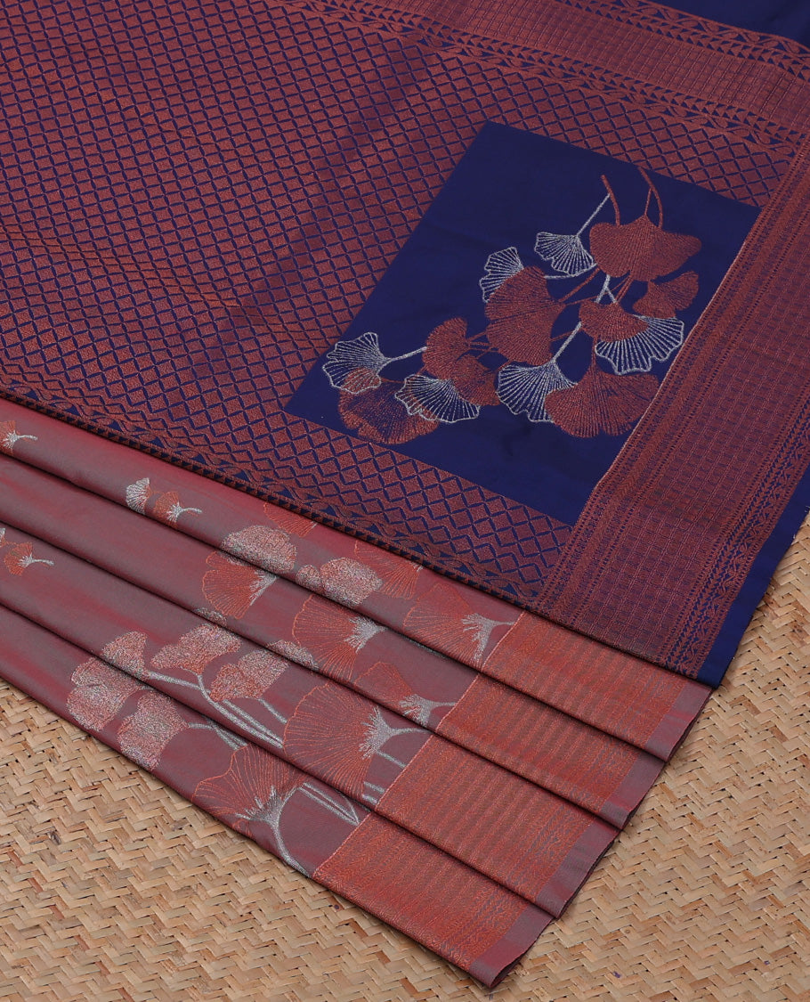 Grey semi-soft silk saree with floral designs, geometric patterned border & contrast pallu of jaal & floral designs