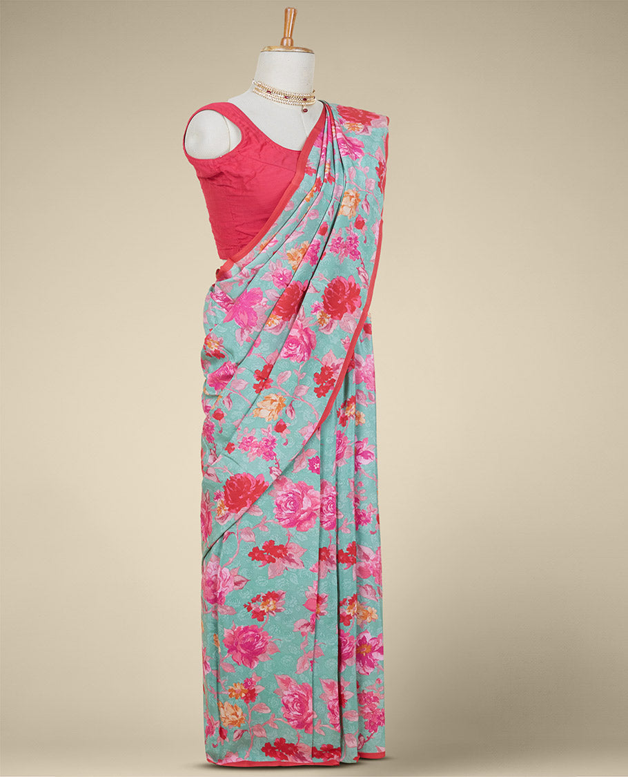 Borderless green-shaded digital printed pure crepe saree features floral vine designs
