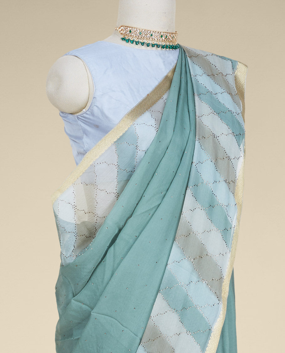 Green leheriya-style printed pure chiffon saree with micro-stonework all over the saree, chevron design border