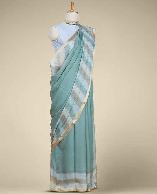Green leheriya-style printed pure chiffon saree with micro-stonework all over the saree, chevron design border
