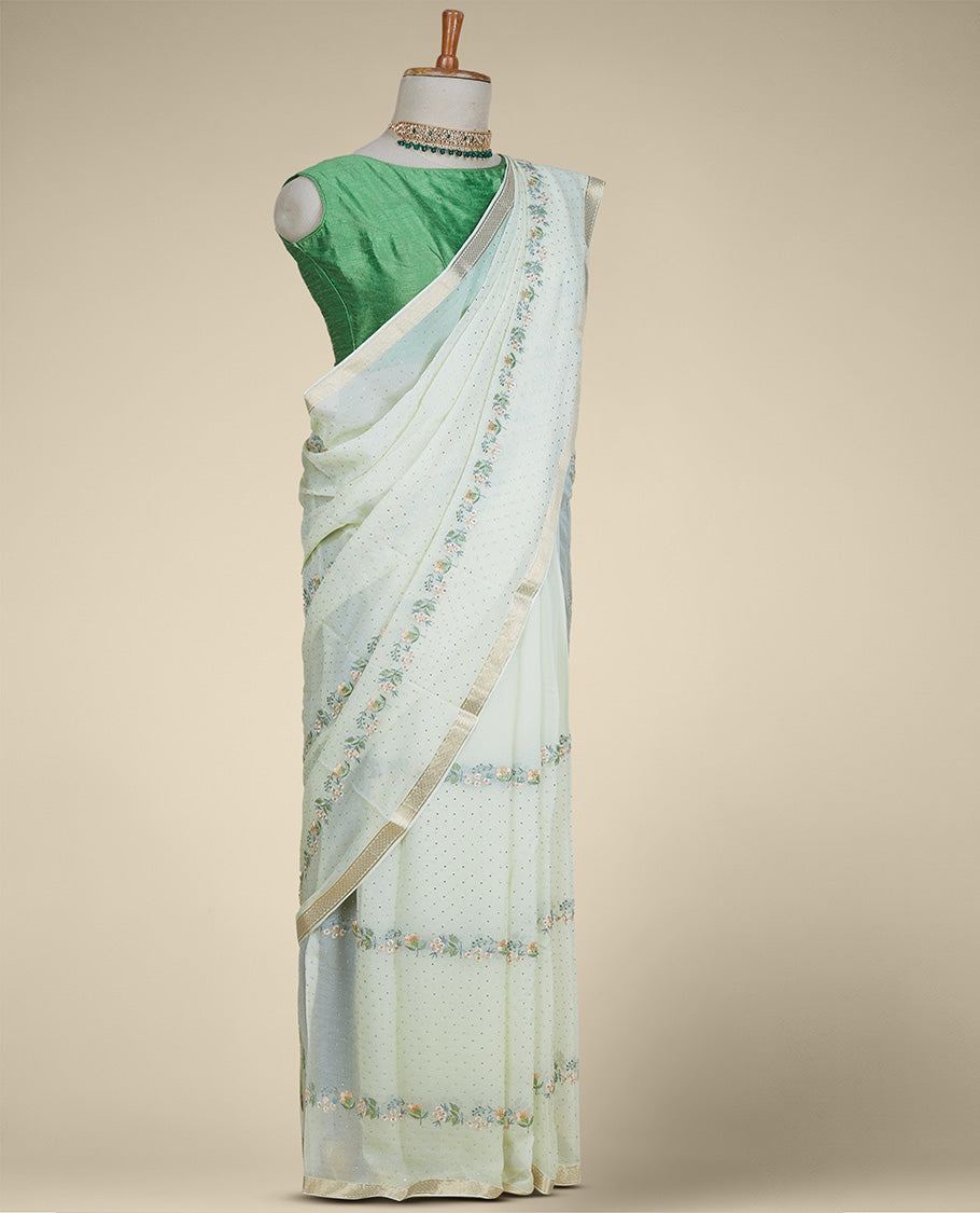 Green embroidered pure chiffon saree with floral designs & micro-stonework all over the saree, zari border