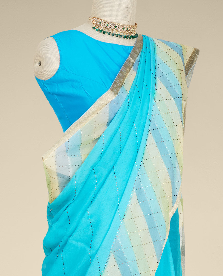 Blue leheriya-style printed pure chiffon saree with micro-stonework all over the saree, chevron design border