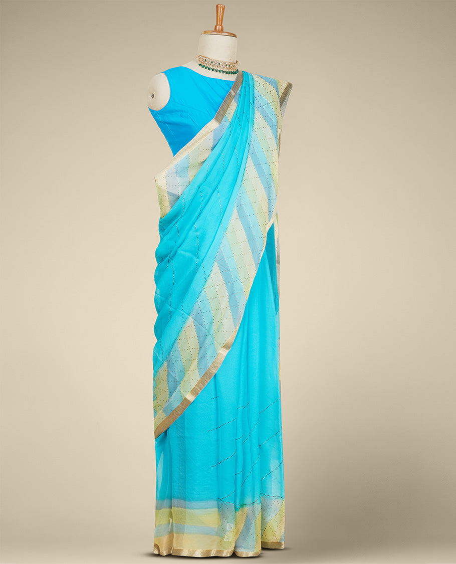 Blue leheriya-style printed pure chiffon saree with micro-stonework all over the saree, chevron design border
