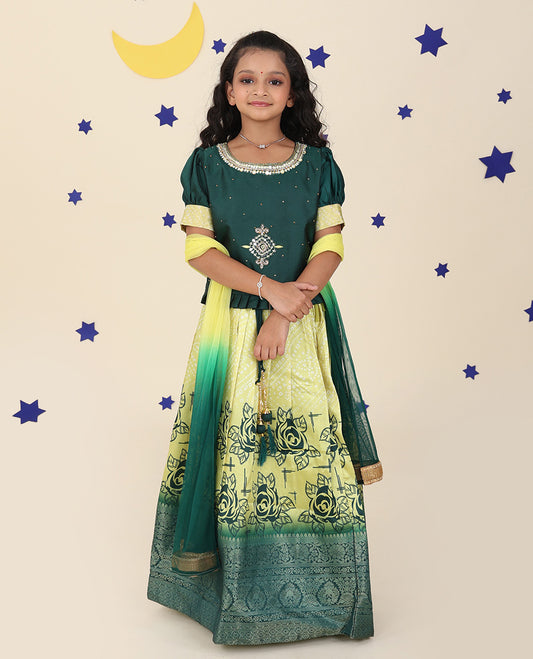 Yellow cholly set features floral & bandhani printed skirt, contrast embroidered puff-sleeve blouse & net dupatta