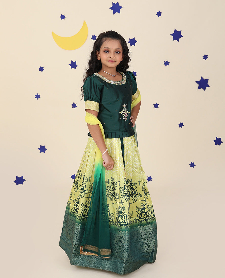 Yellow cholly set features floral & bandhani printed skirt, contrast embroidered puff-sleeve blouse & net dupatta
