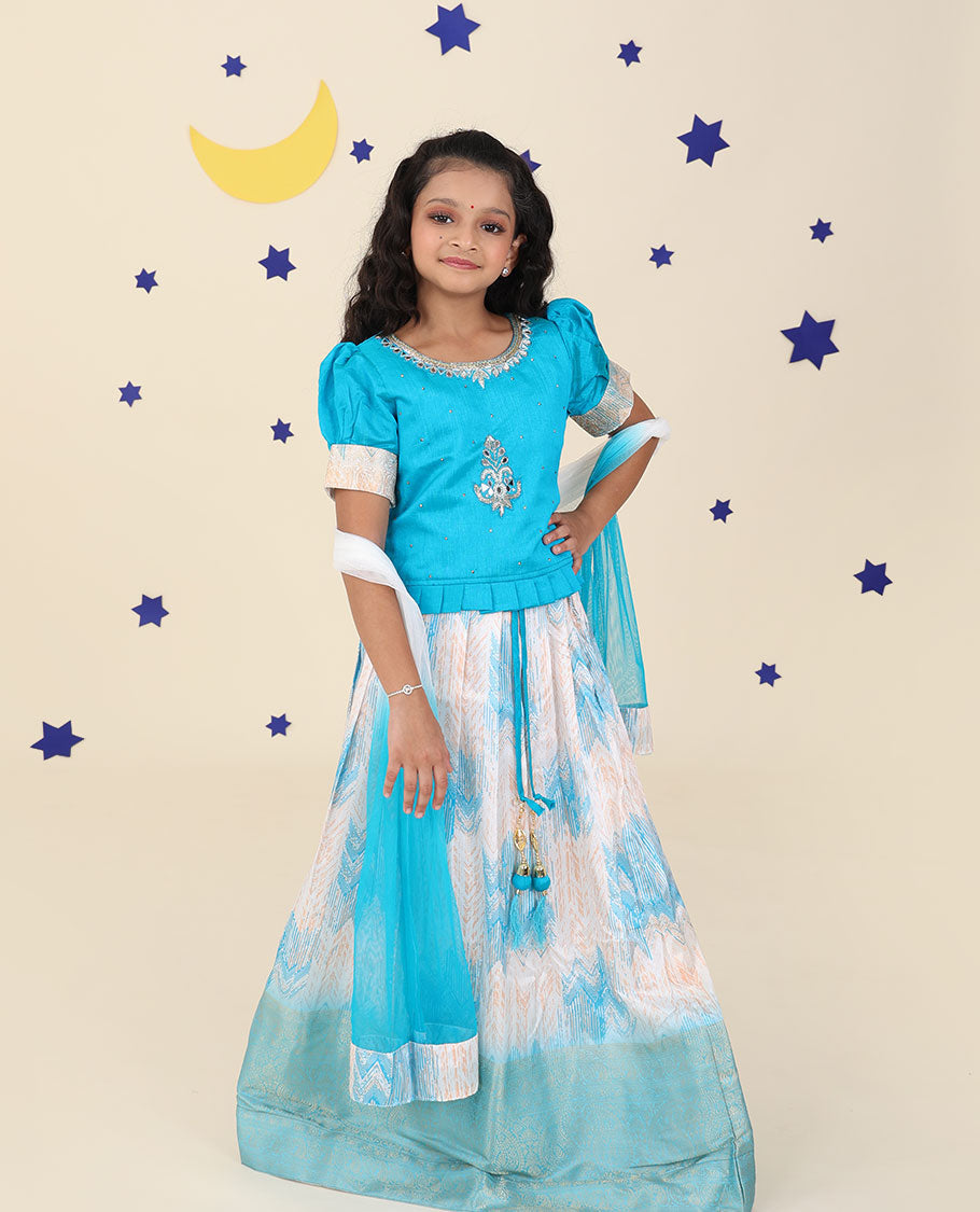 Cream cholly set features jacquard & traditional zari border skirt,contrast embroidered puff-sleeve blouse & net dupatta