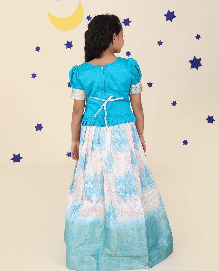 Cream cholly set features jacquard & traditional zari border skirt,contrast embroidered puff-sleeve blouse & net dupatta