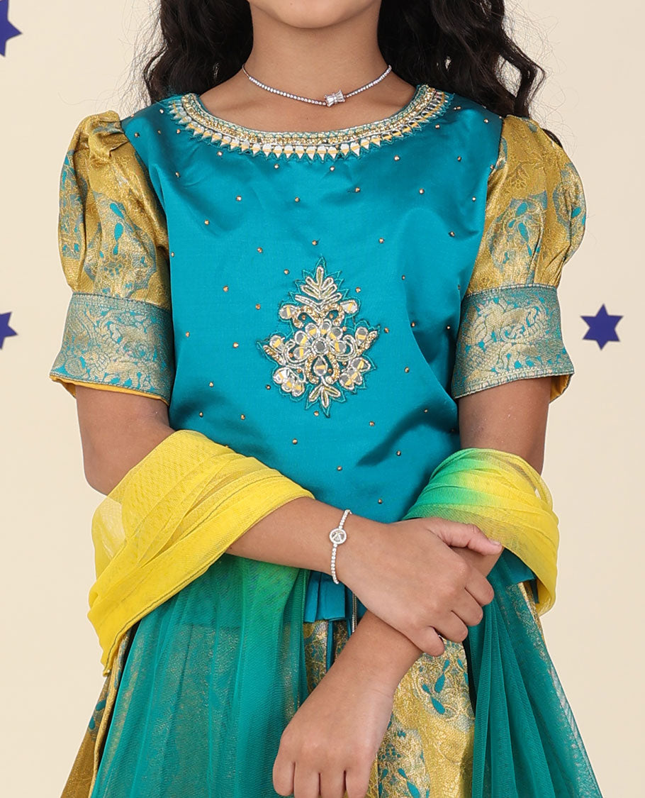 Yellow cholly set features jacquard & traditional border skirt, contrast embroidered puff-sleeve blouse & net dupatta