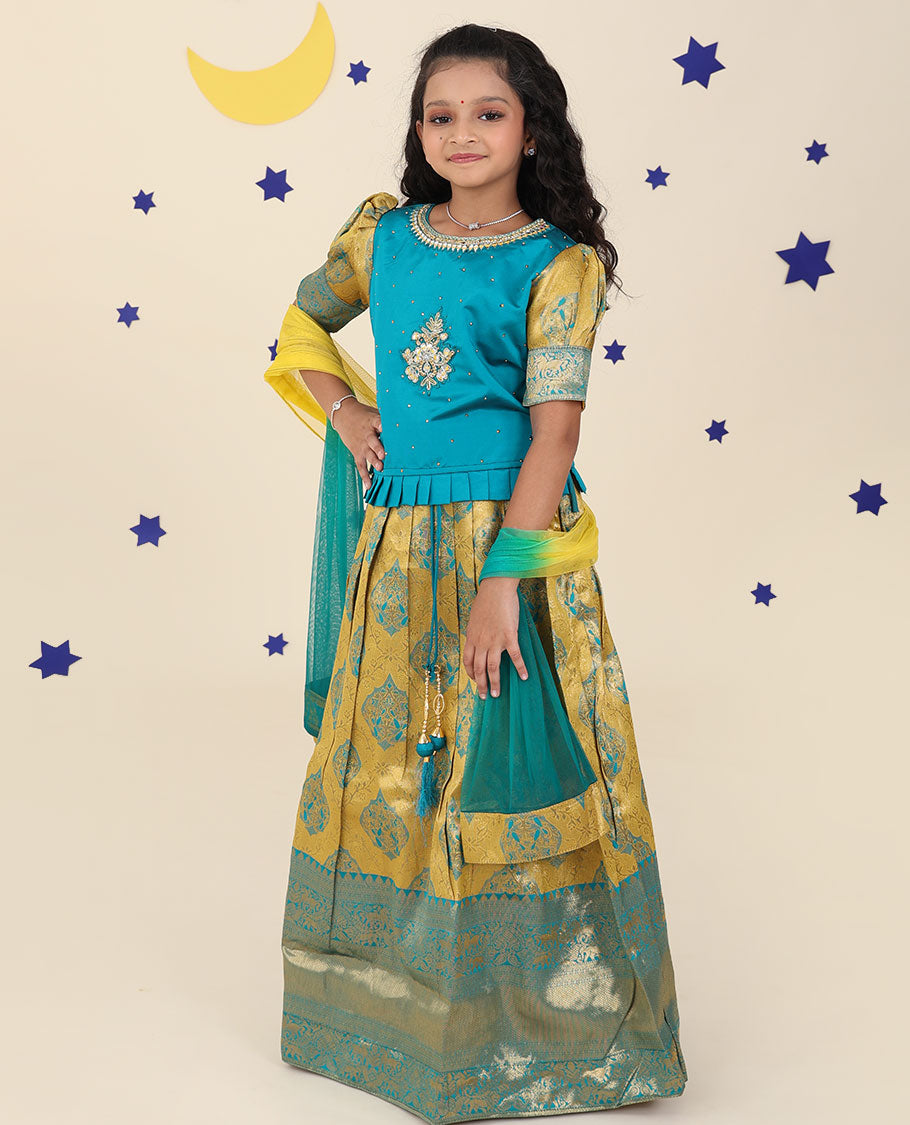 Yellow cholly set features jacquard & traditional border skirt, contrast embroidered puff-sleeve blouse & net dupatta
