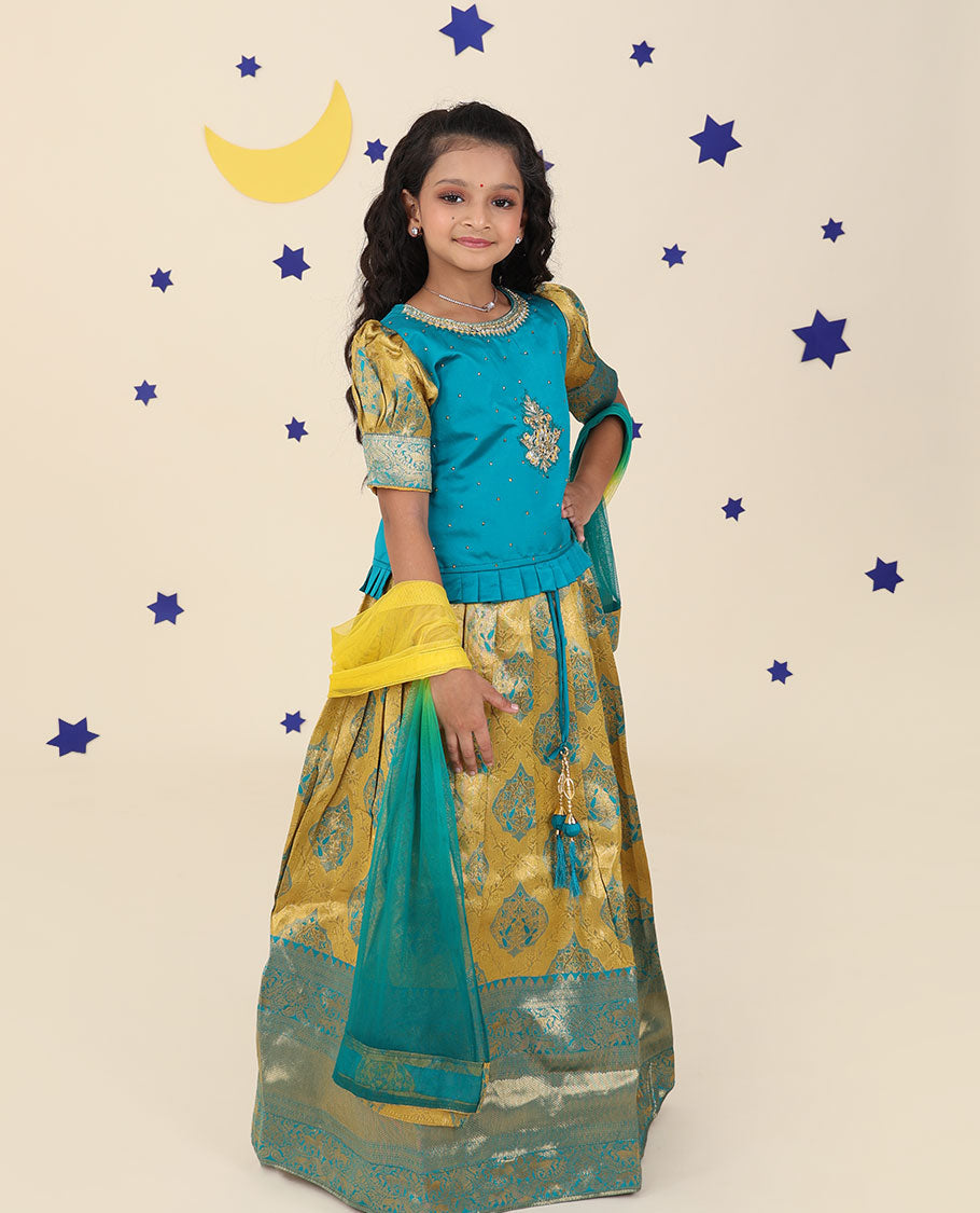 Yellow cholly set features jacquard & traditional border skirt, contrast embroidered puff-sleeve blouse & net dupatta