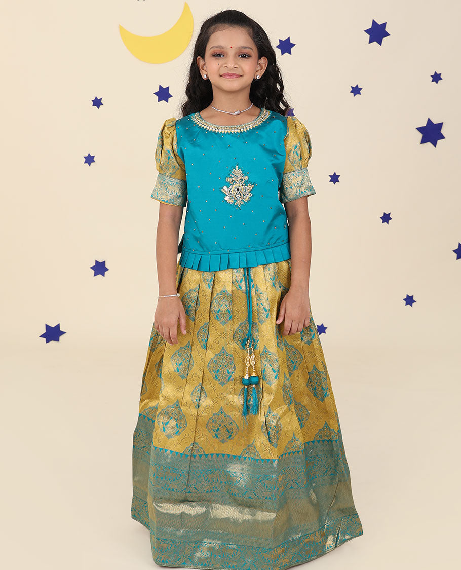 Yellow cholly set features jacquard & traditional border skirt, contrast embroidered puff-sleeve blouse & net dupatta