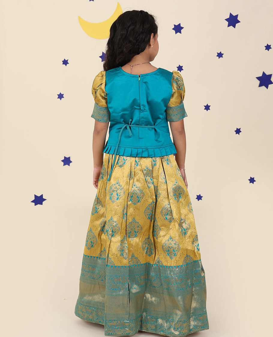 Yellow cholly set features jacquard & traditional border skirt, contrast embroidered puff-sleeve blouse & net dupatta