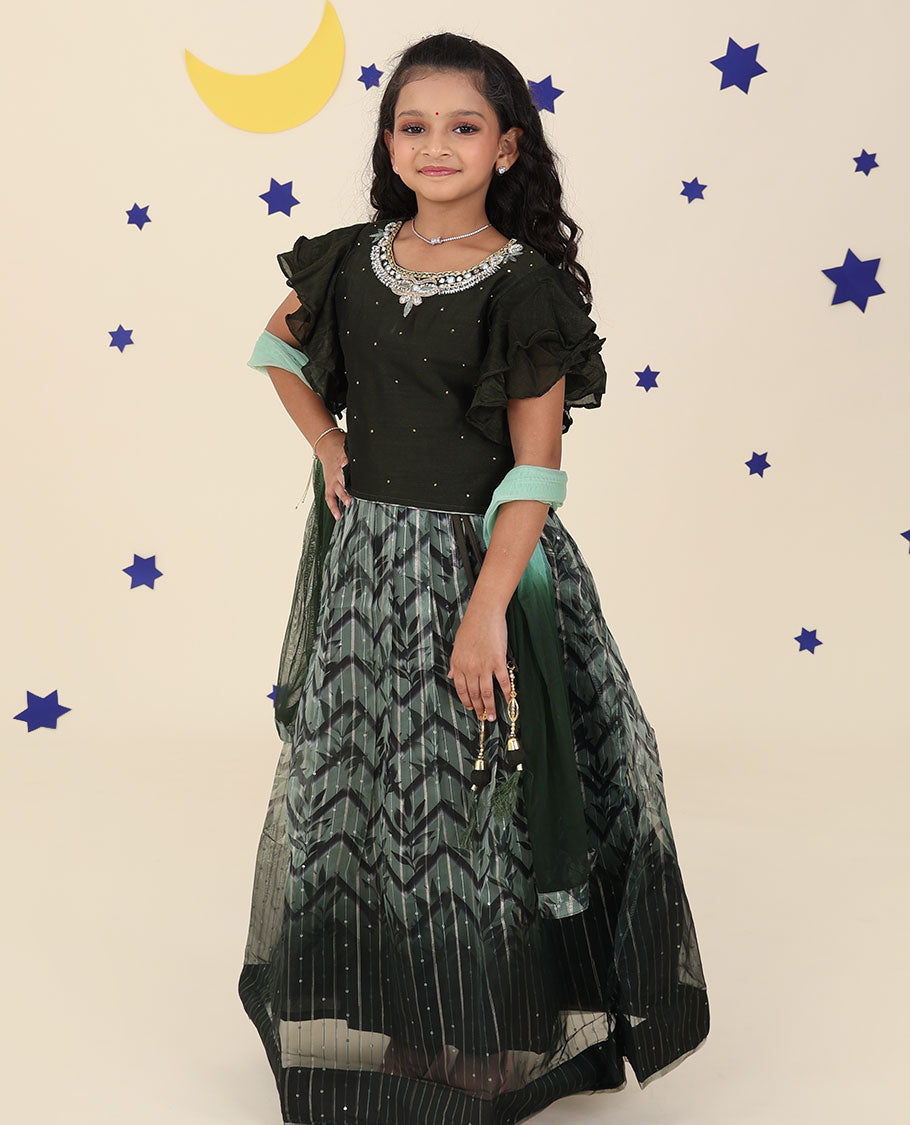 Green cholly set features intricately printed skirt, embroidered butterfly sleeve blouse & net dupatta	