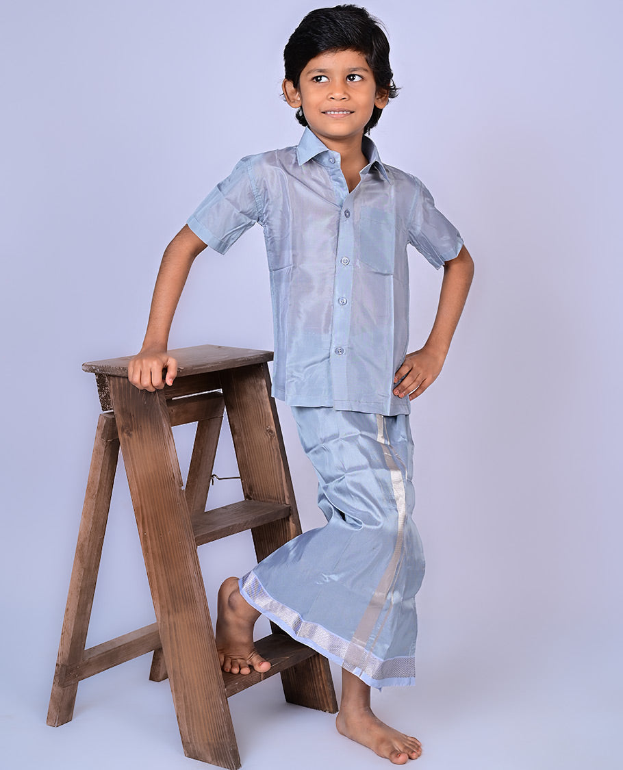 Grey art-silk boys dhoti set features a solid half-sleeve shirt & zari border velcro dhoti 