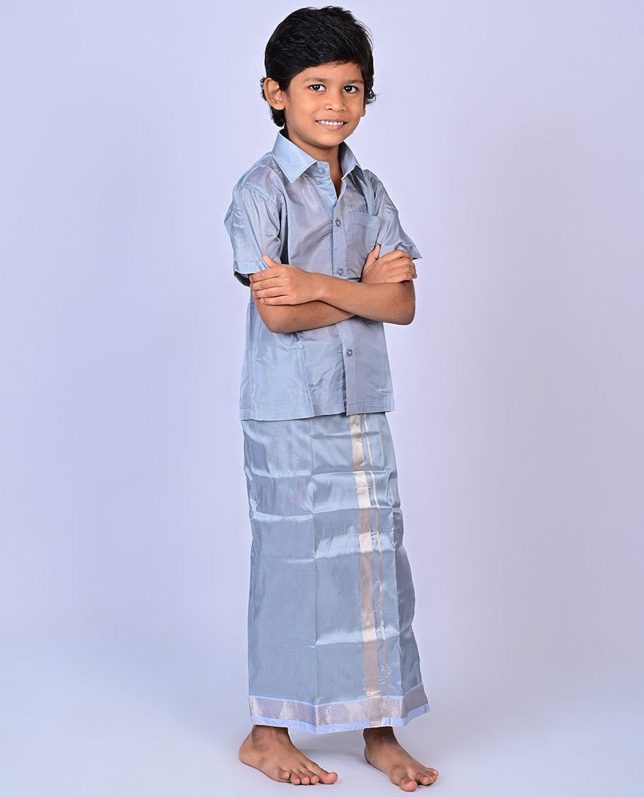 Grey art-silk boys dhoti set features a solid half-sleeve shirt & zari border velcro dhoti 