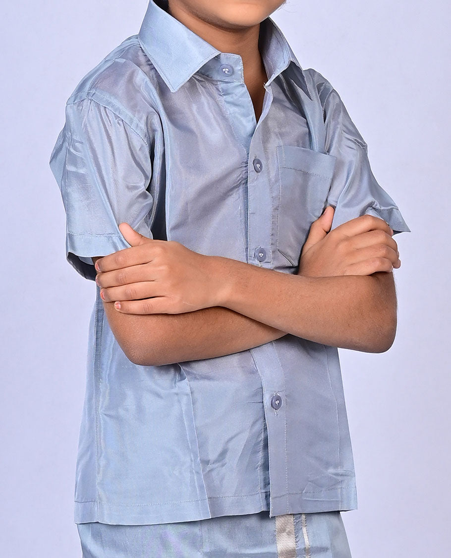 Grey art-silk boys dhoti set features a solid half-sleeve shirt & zari border velcro dhoti 
