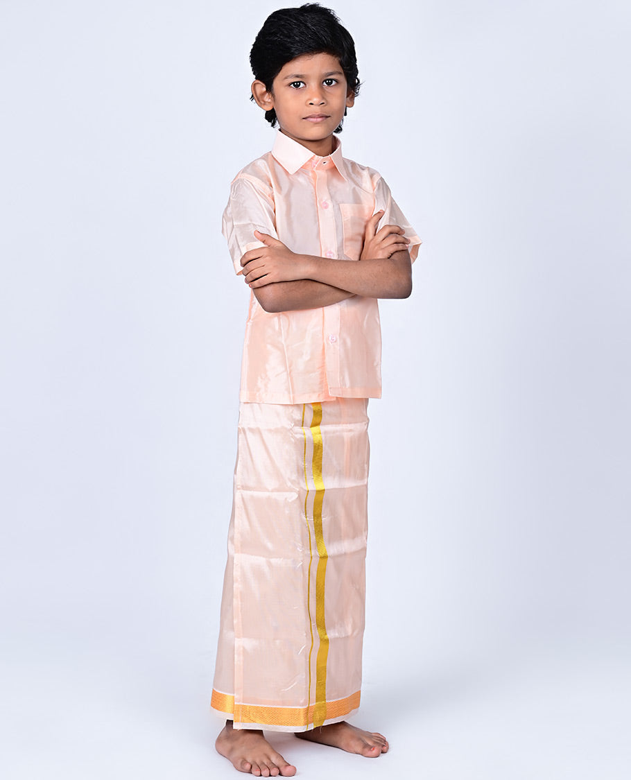 Coral art-silk boys dhoti set features a solid half-sleeve shirt & zari border velcro dhoti 