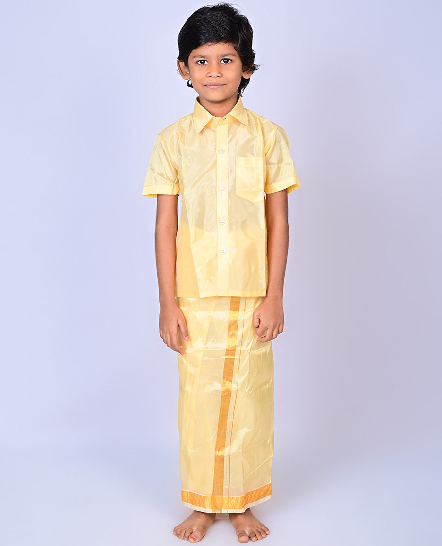 Gold art-silk boys dhoti set features a solid half-sleeve shirt & zari border velcro dhoti 