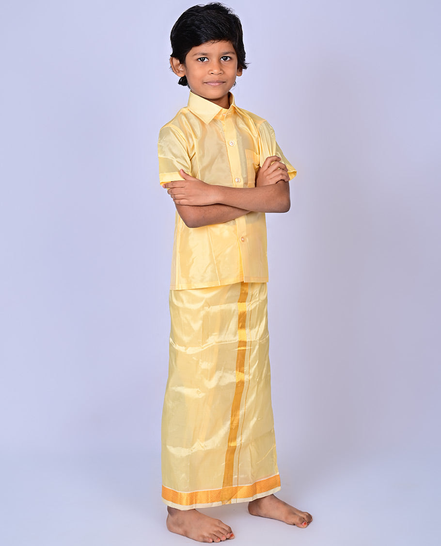 Gold art-silk boys dhoti set features a solid half-sleeve shirt & zari border velcro dhoti 