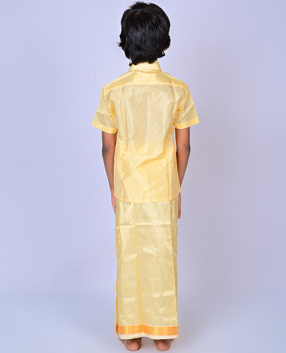 Gold art-silk boys dhoti set features a solid half-sleeve shirt & zari border velcro dhoti 