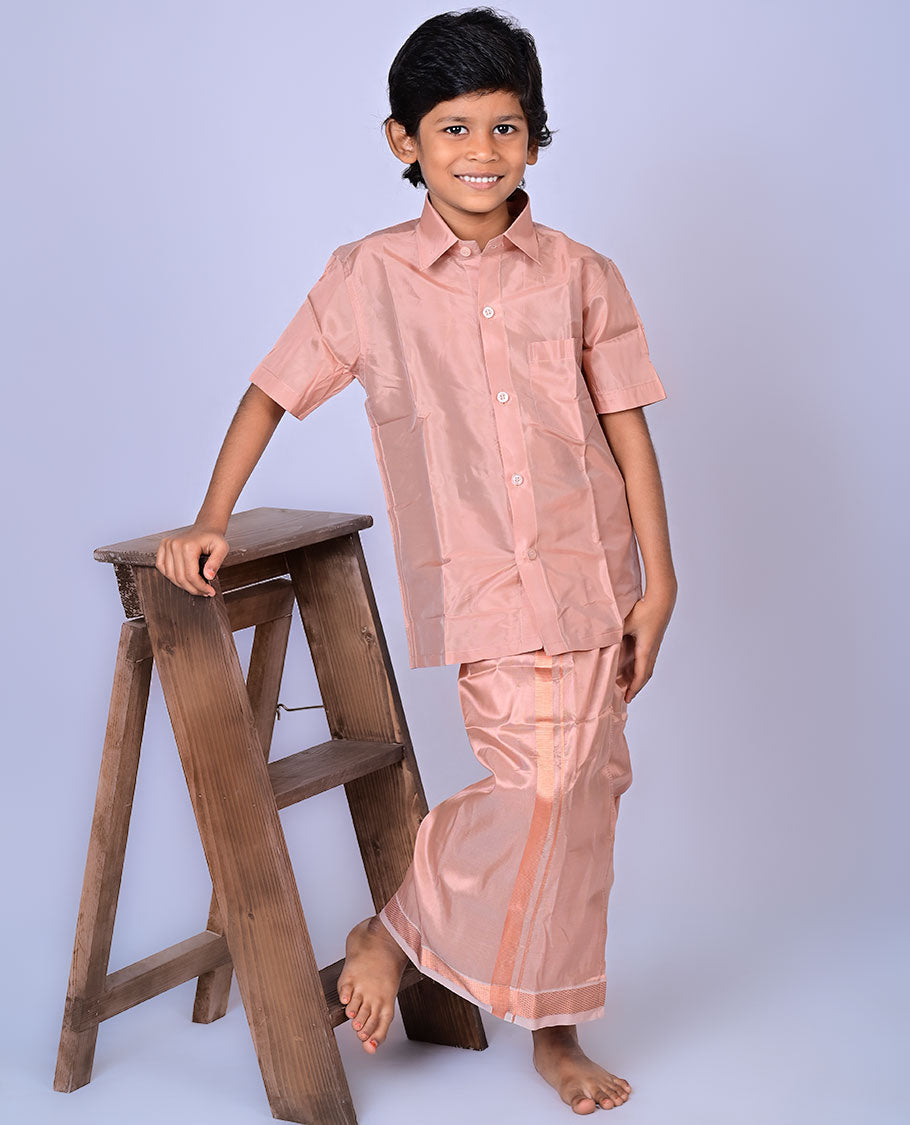 Copper art-silk boys dhoti set features a solid half-sleeve shirt & zari border velcro dhoti 