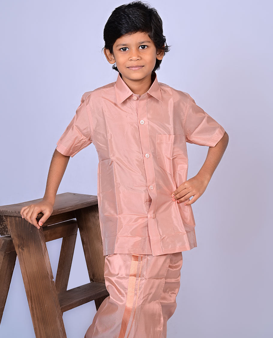 Copper art-silk boys dhoti set features a solid half-sleeve shirt & zari border velcro dhoti 