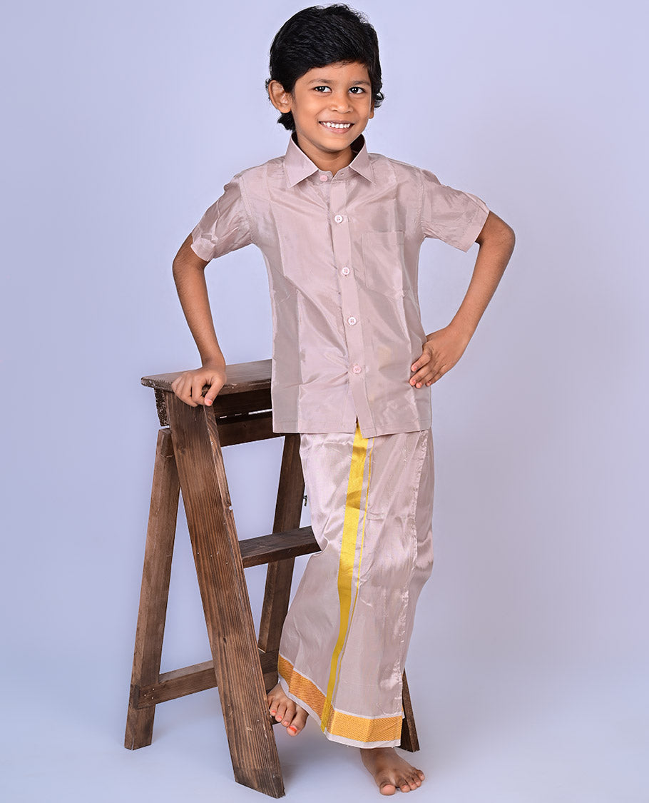 Sanston art-silk boys dhoti set features a solid half-sleeve shirt & zari border velcro dhoti 