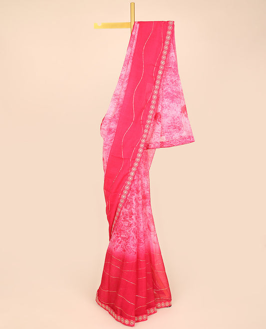 Pink uniquely printed casual wear saree with zig-zag stripes, floral embroidered border