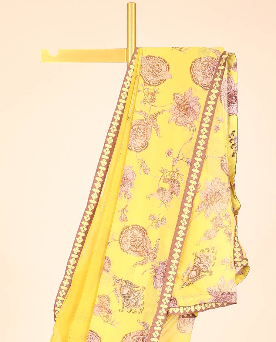 Yellow casual wear saree with floral vine designs on its body, contrast patchwork border 