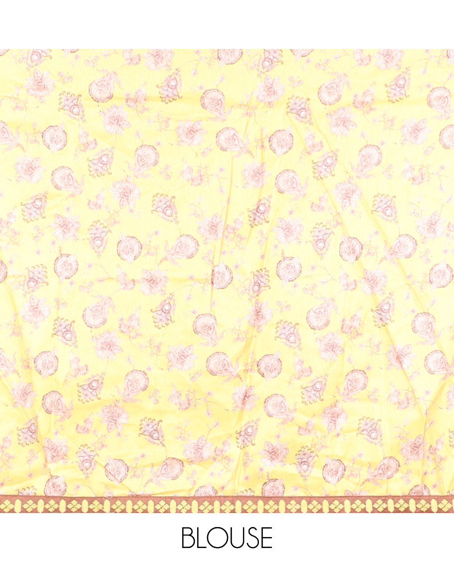 Yellow casual wear saree with floral vine designs on its body, contrast patchwork border 