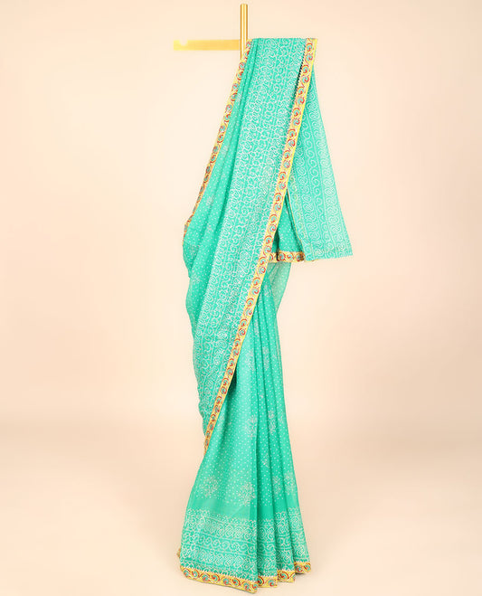 Turquoise blue bandhani-style intricately printed casual wear saree, embroidered border 