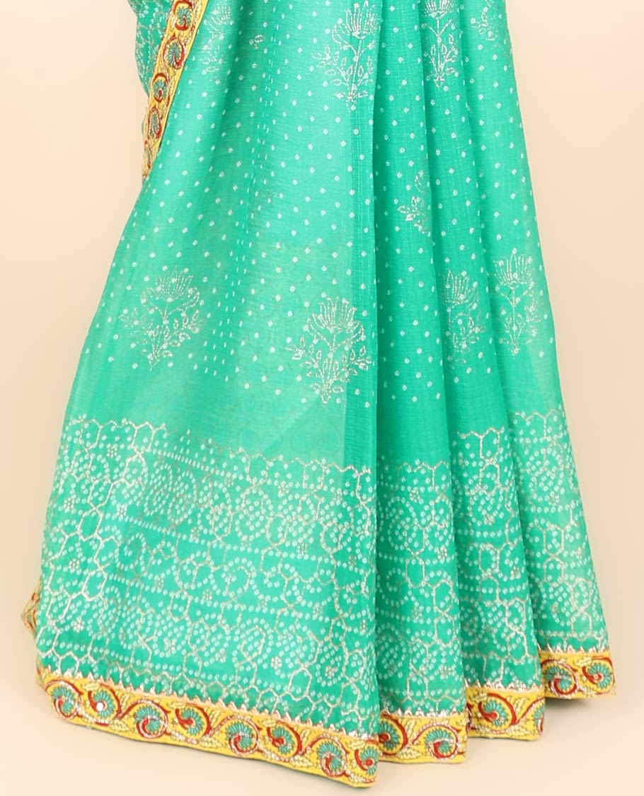 Turquoise blue bandhani-style intricately printed casual wear saree, embroidered border 
