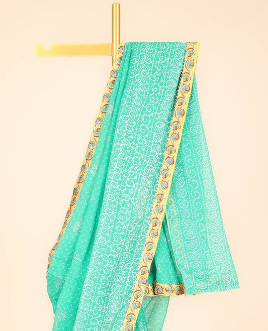 Turquoise blue bandhani-style intricately printed casual wear saree, embroidered border 