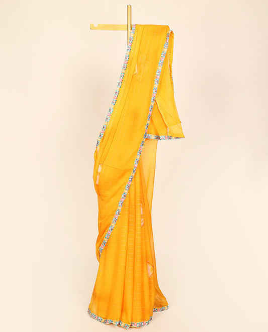 Yellow casual wear saree with stripes & buttas, floral creeper embroidered patchwork border