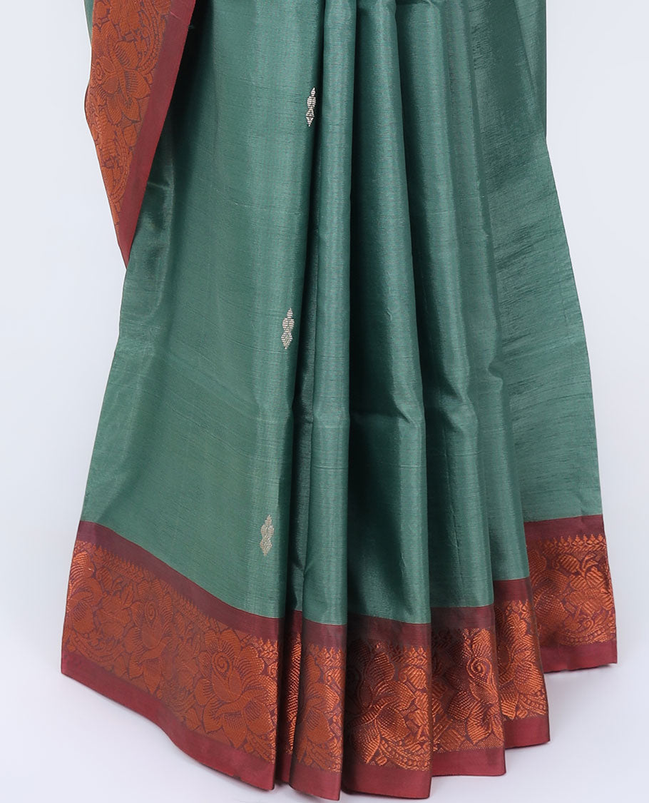 Green banana pith saree with unique buttas, contrast floral design border & pallu of stripes 