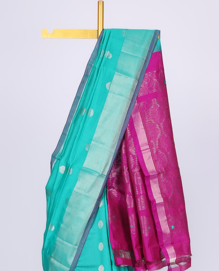 Blue kuppadam cotton saree with zari polka dot buttas, zari border & contrast pallu of ogee patterns