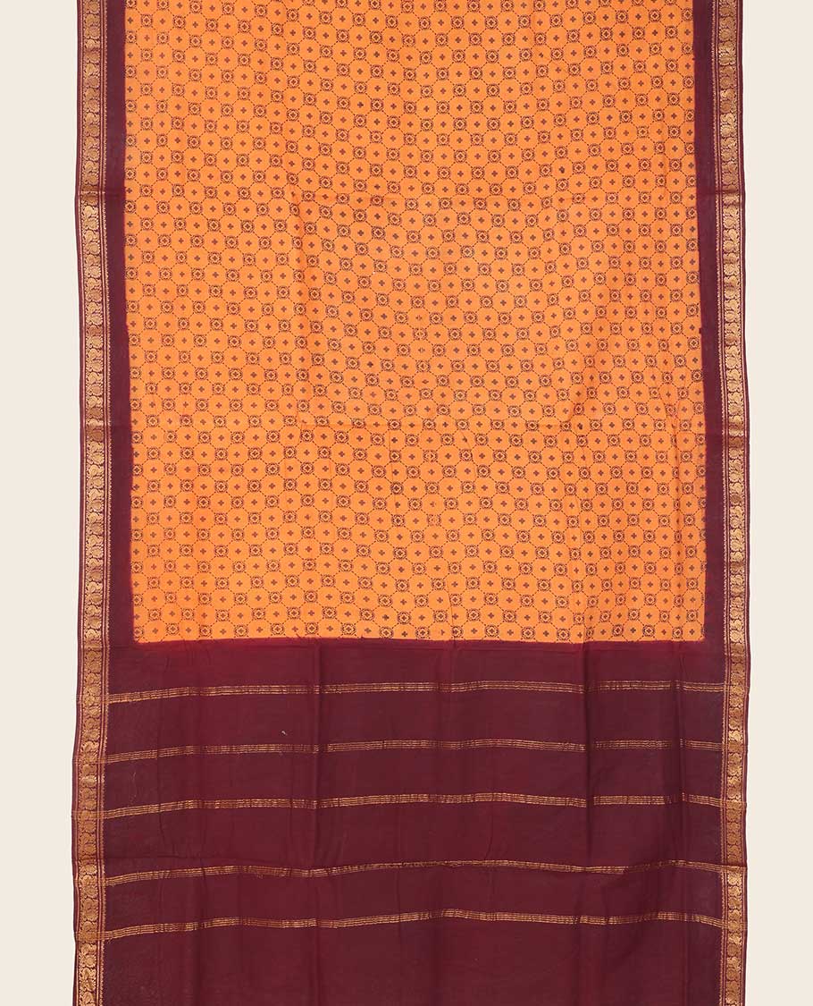 Orange geometric patterned nine-yard cotton saree, contrast peacock design border & pallu of stripes