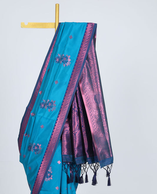 Blue butter silk saree with floral buttas, contrast rose copper zari design border & intricate pallu
